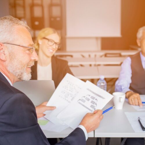 business people discussing patient data